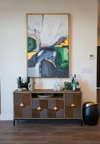 a room with a table and chairs