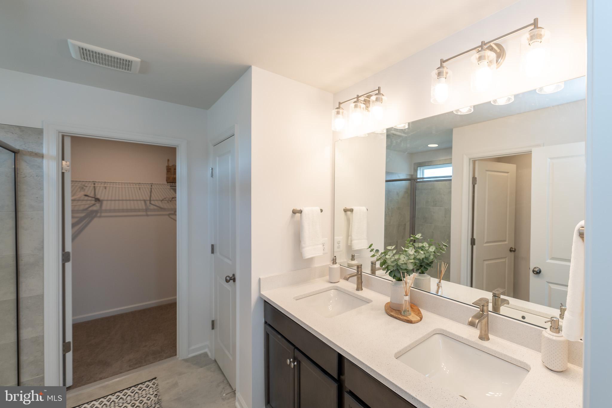 121 Indian Hills Road Locust Grove, VA 22508 - Photo 19 of 26 a bathroom with a sink and a mirror
