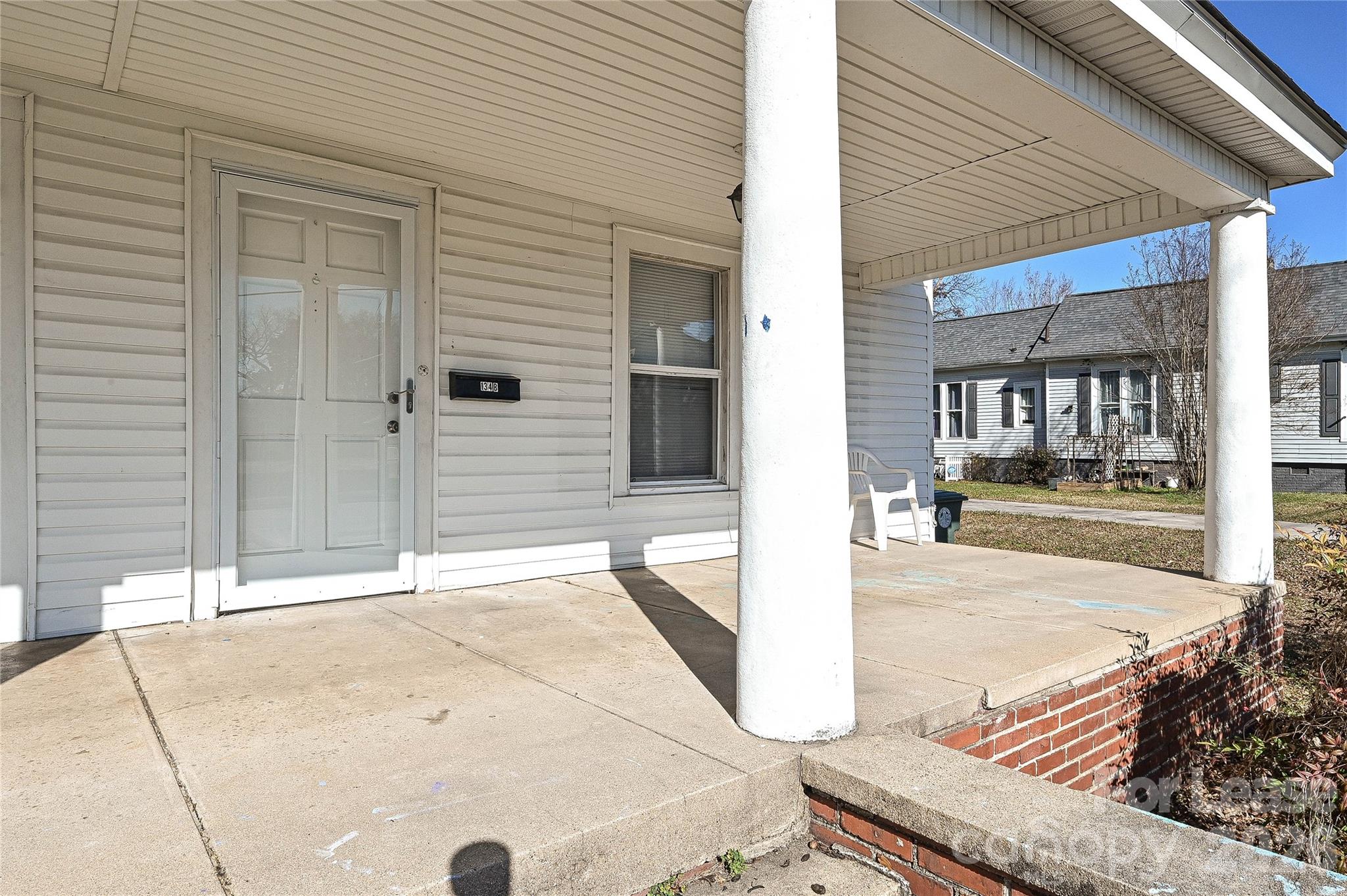 134 Saluda Street, Unit B Chester, SC 29706 - Photo 2 of 21 a house with a bench
