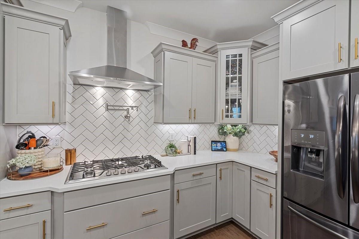 1112 Baldwin Drive Lancaster, SC 29720 - Photo 16 of 48 a kitchen with stainless steel appliances a refrigerator stove and sink