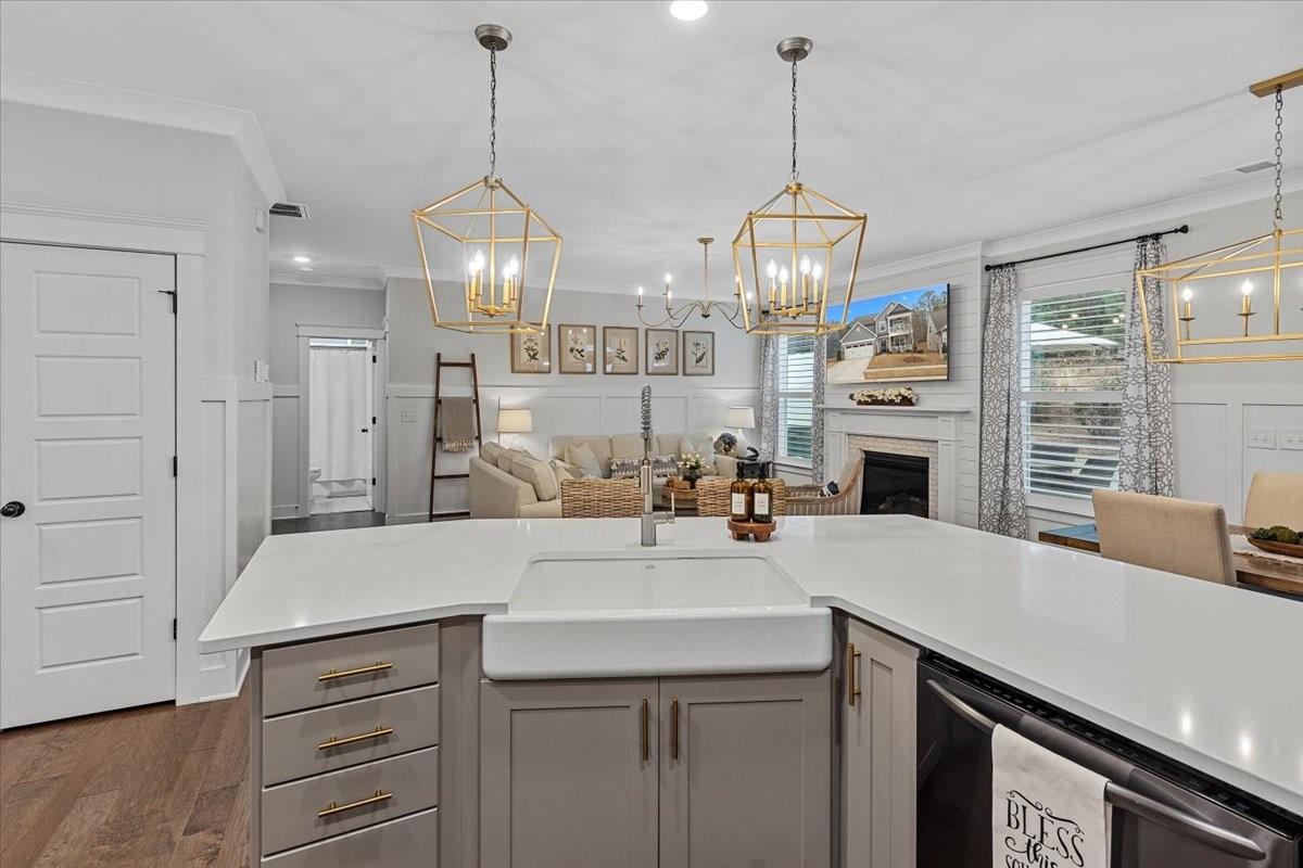 1112 Baldwin Drive Lancaster, SC 29720 - Photo 17 of 48 a kitchen with a sink a center island and cabinets
