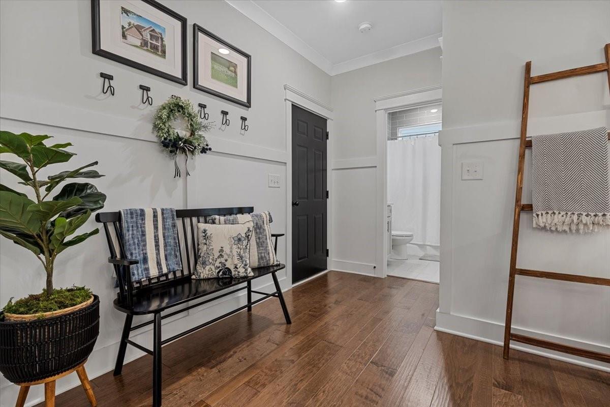 1112 Baldwin Drive Lancaster, SC 29720 - Photo 20 of 48 a view of a hallway with furniture and a potted plant