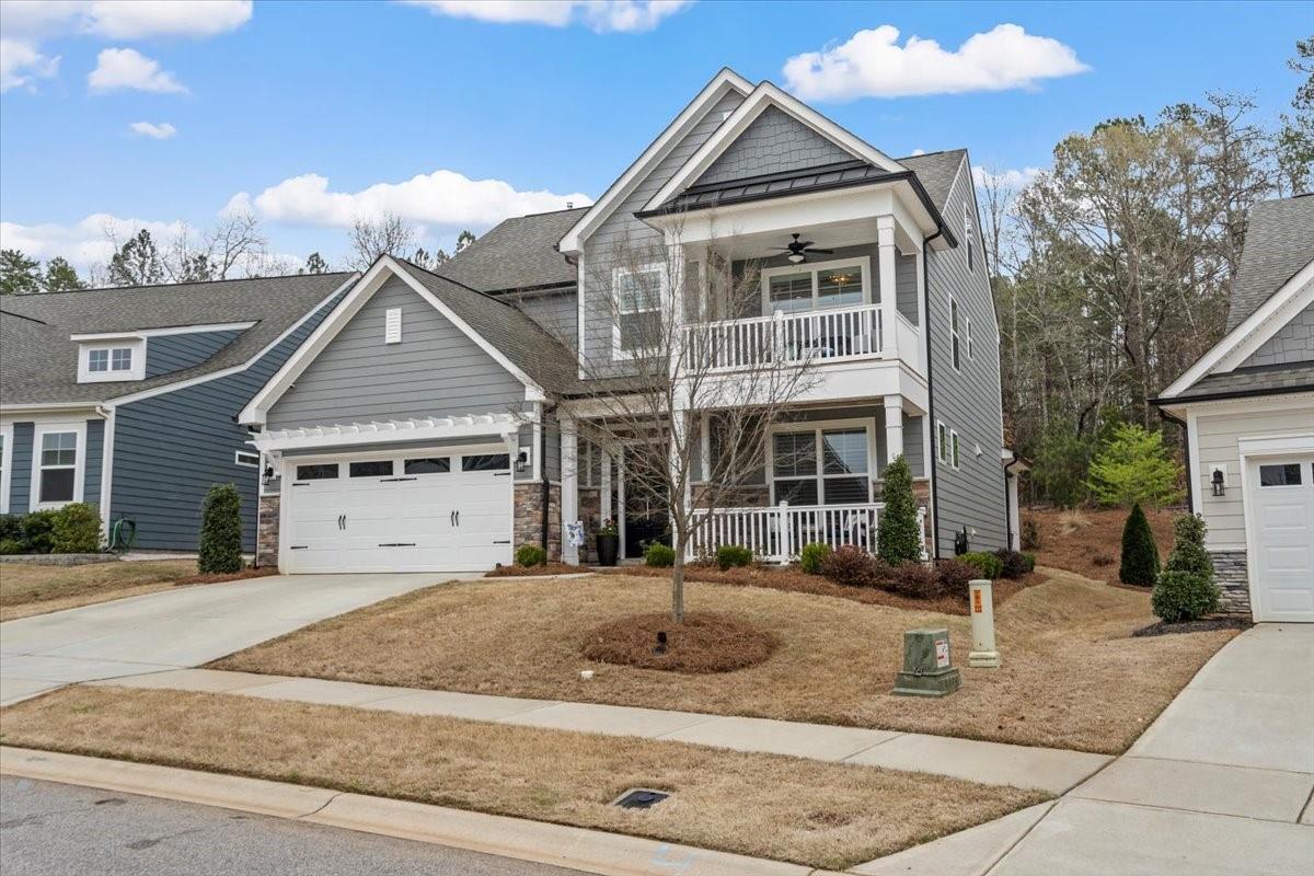 1112 Baldwin Drive Lancaster, SC 29720 - Photo 2 of 48 a front view of a house with garden