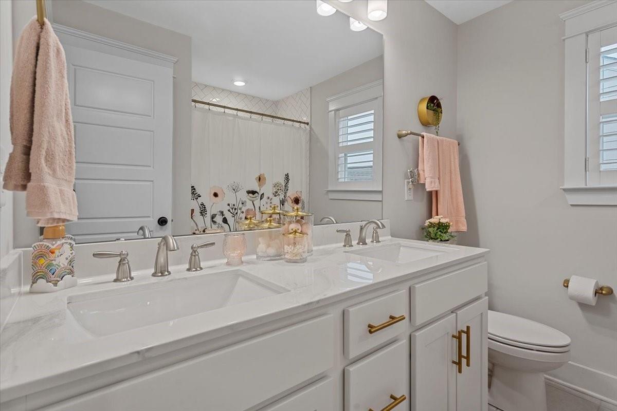 1112 Baldwin Drive Lancaster, SC 29720 - Photo 31 of 48 a bathroom with a sink and a toilet