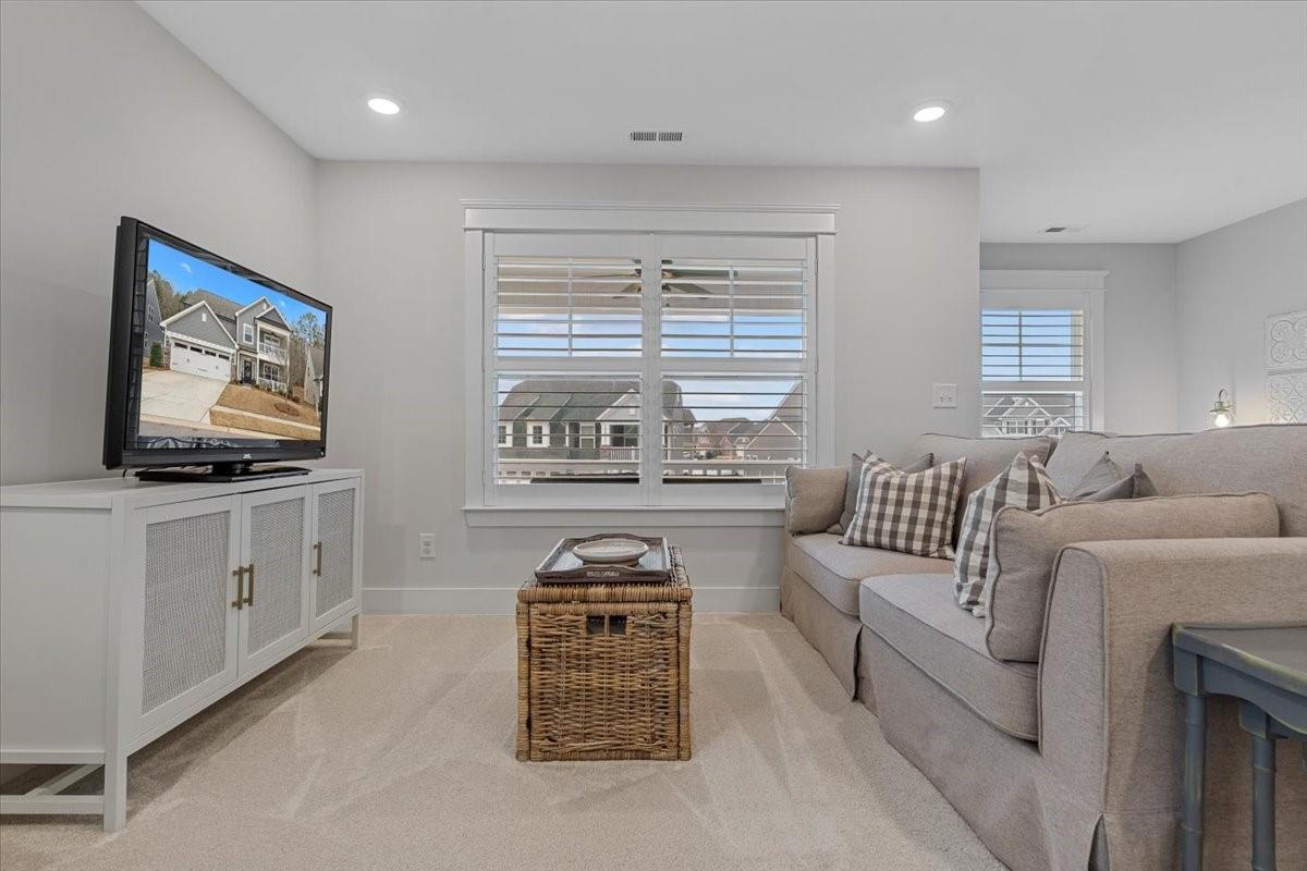 1112 Baldwin Drive Lancaster, SC 29720 - Photo 33 of 48 a living room with furniture and a flat screen tv