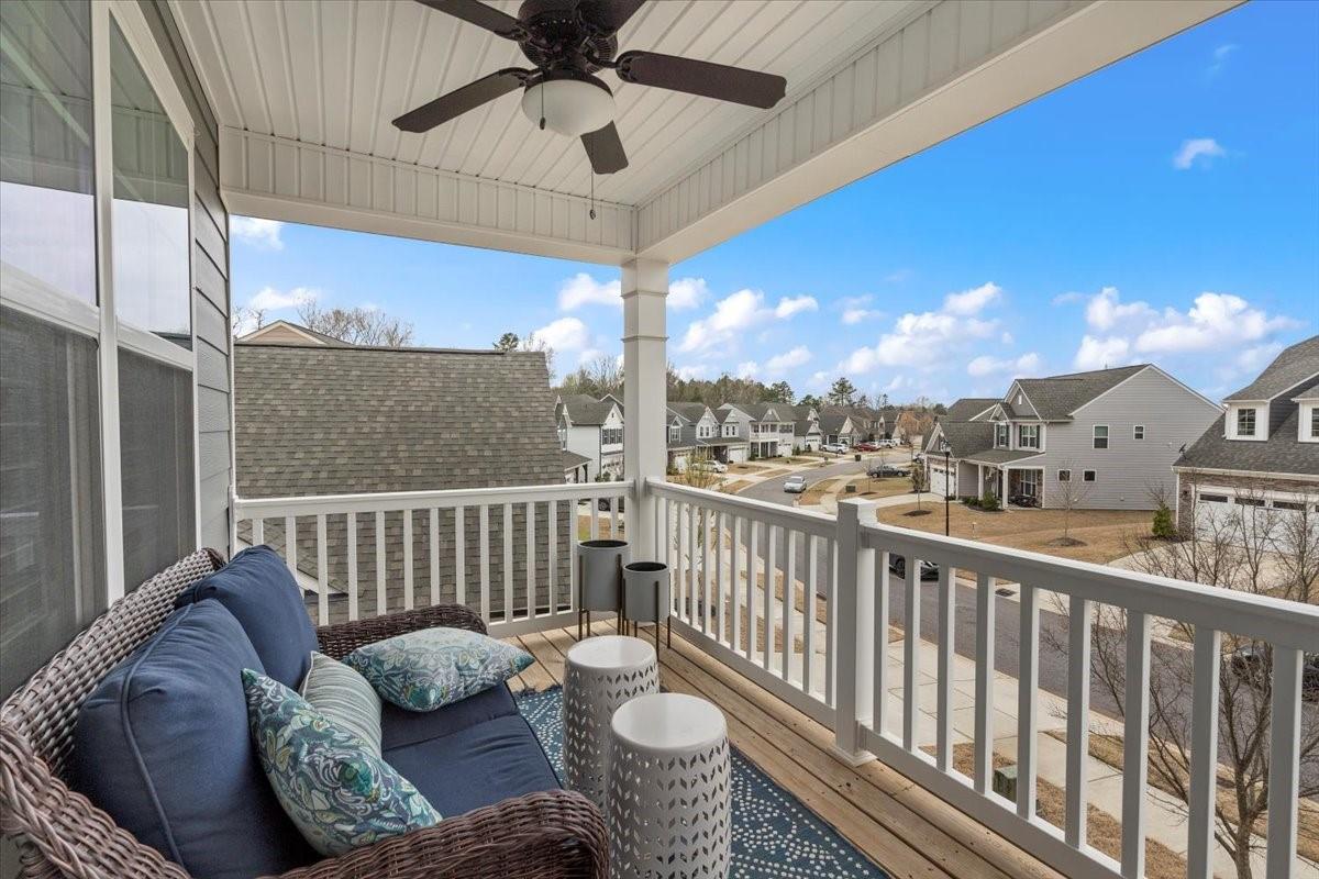 1112 Baldwin Drive Lancaster, SC 29720 - Photo 37 of 48 a view of a balcony with couches and a potted plant