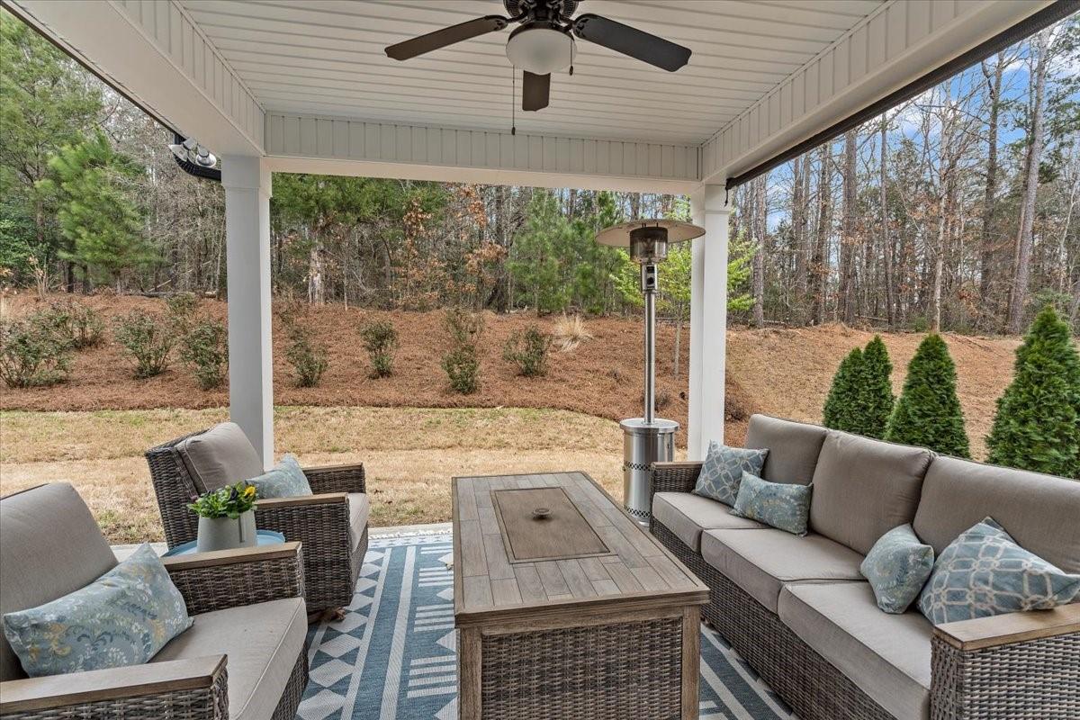1112 Baldwin Drive Lancaster, SC 29720 - Photo 48 of 48 a living room with furniture and a floor to ceiling window