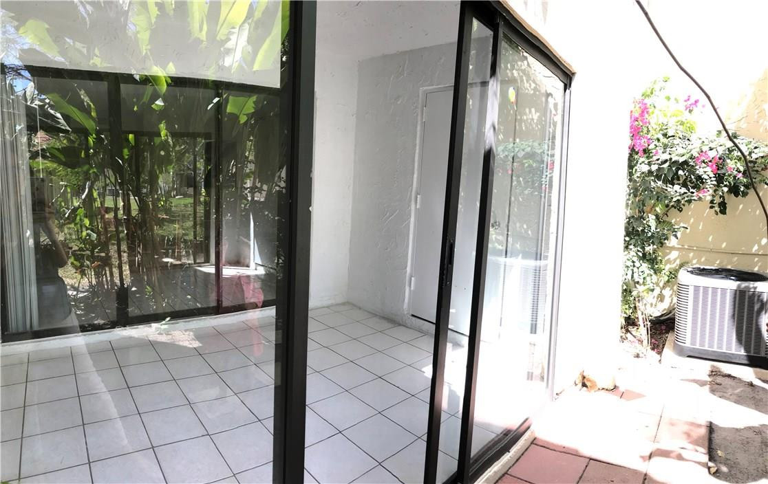 22435 Southwest 61st Way, Unit B124 Boca Raton, FL 33428 - Photo 24 of 35 a view of a glass door