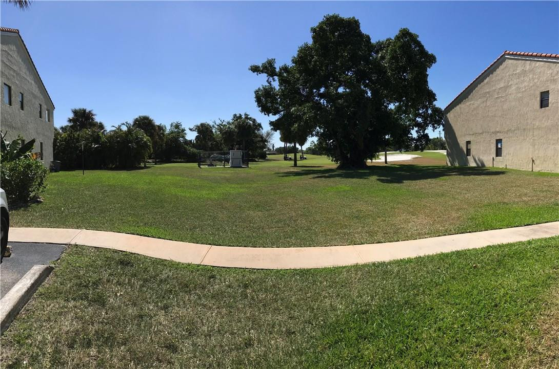 22435 Southwest 61st Way, Unit B124 Boca Raton, FL 33428 - Photo 29 of 35 a view of a green field