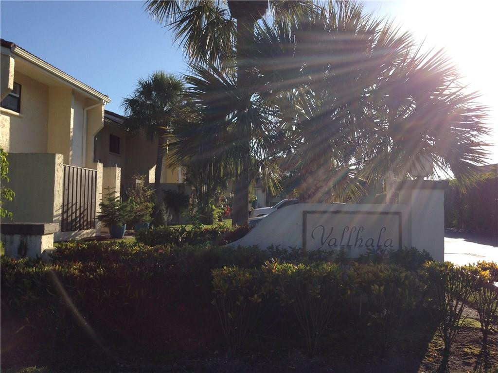 22435 Southwest 61st Way, Unit B124 Boca Raton, FL 33428 - Photo 35 of 35 a view of a street with a building in front of it
