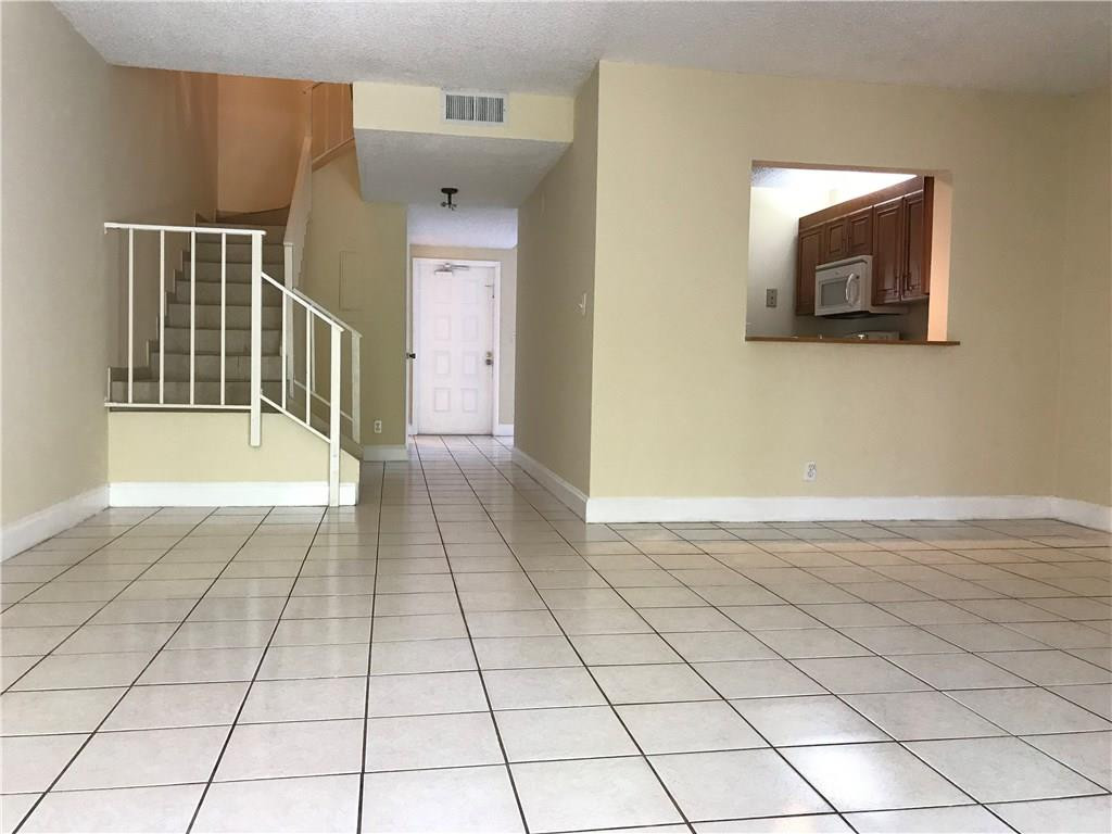 22435 Southwest 61st Way, Unit B124 Boca Raton, FL 33428 - Photo 8 of 35 a view of a hallway with entryway