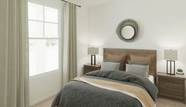 a bedroom with a bed and window