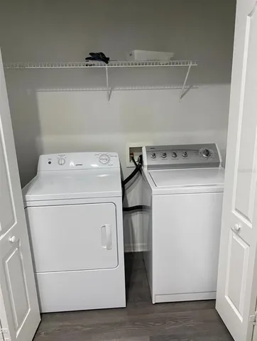 a utility room with dryer and washer