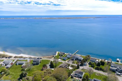 an aerial view of beach and ocean