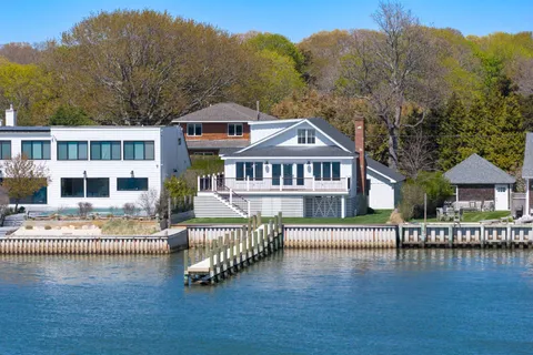 an aerial view of a house with a garden