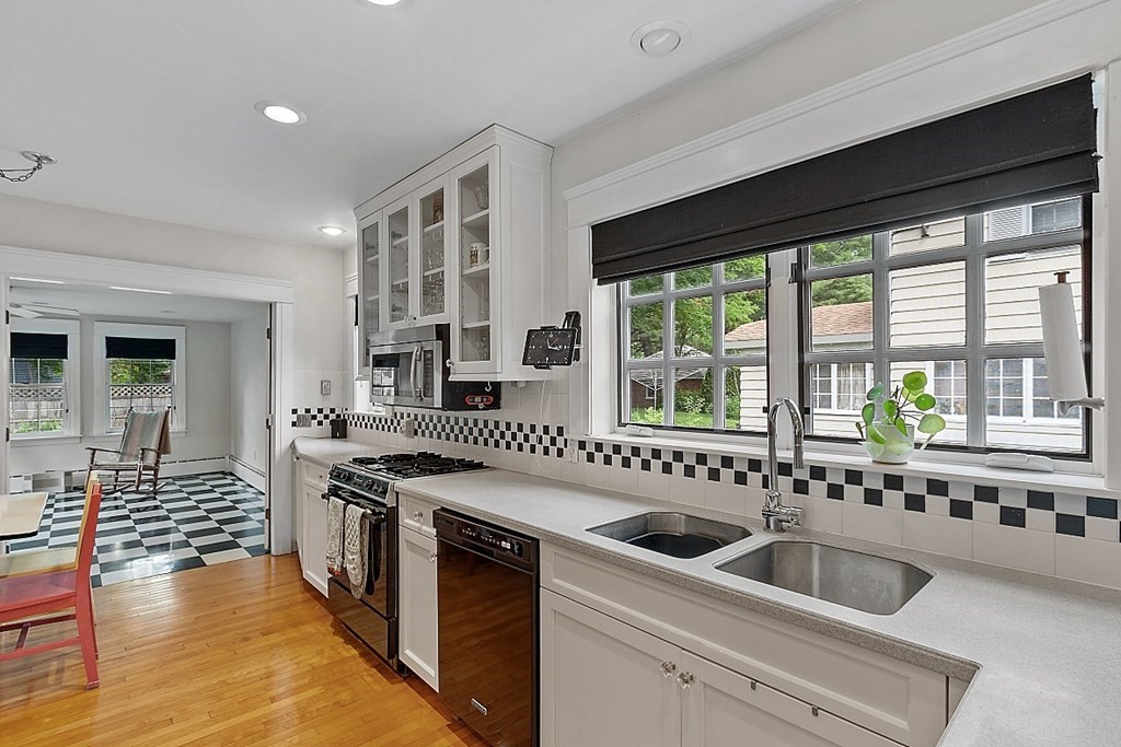 65 Commodore Road Worcester, MA 01602 - Photo 20 of 33 a kitchen that has a sink and a stove