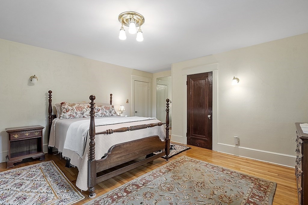 65 Commodore Road Worcester, MA 01602 - Photo 22 of 33 a bedroom with a bed and a dresser