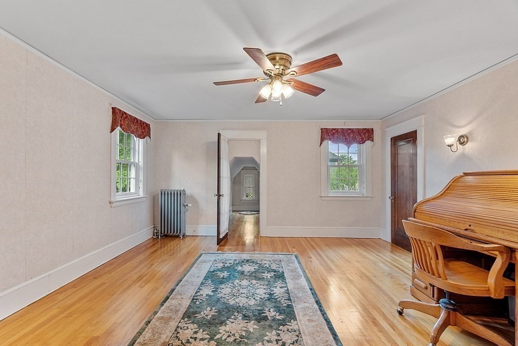 65 Commodore Road Worcester, MA 01602 - Photo 24 of 33 a bedroom with a bed and a window