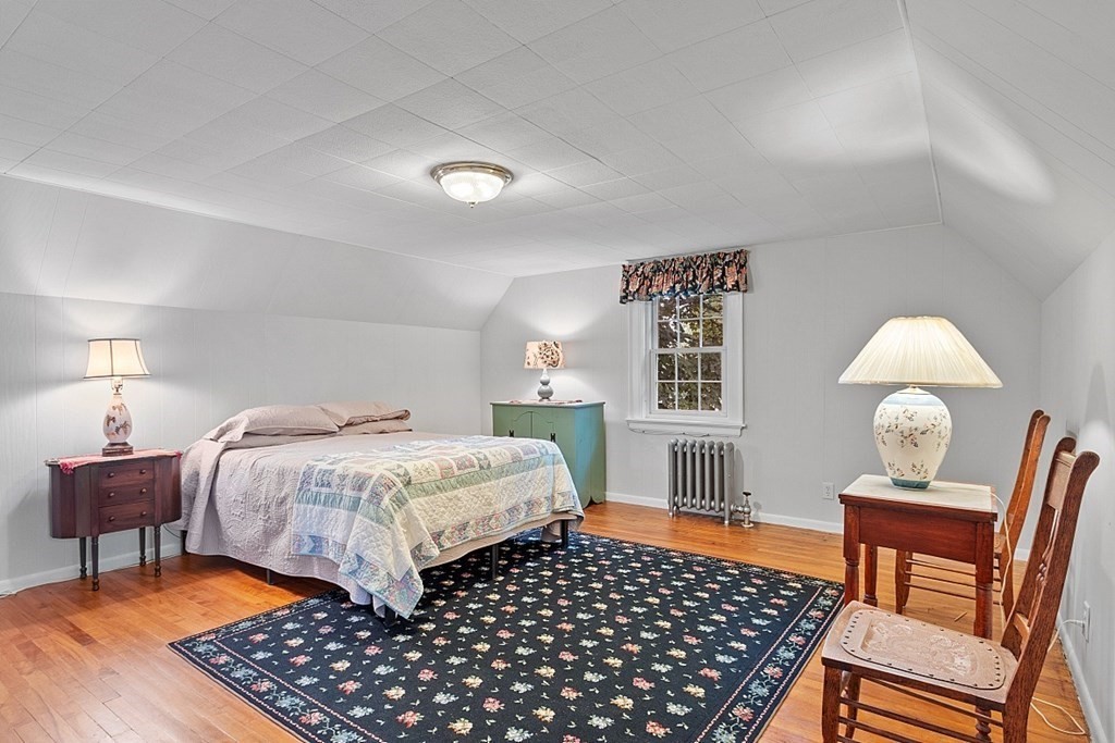 65 Commodore Road Worcester, MA 01602 - Photo 30 of 33 a bedroom with a bed and a desk