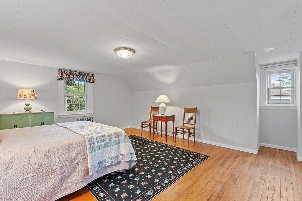 65 Commodore Road Worcester, MA 01602 - Photo 31 of 33 a bedroom with a bed window and a table