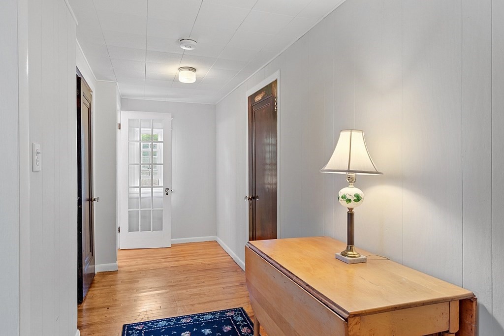 65 Commodore Road Worcester, MA 01602 - Photo 32 of 33 a room that has a bed and a table in it