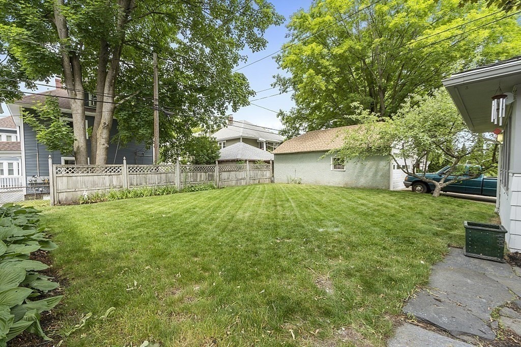 65 Commodore Road Worcester, MA 01602 - Photo 6 of 33 a view of a house with backyard and a tree
