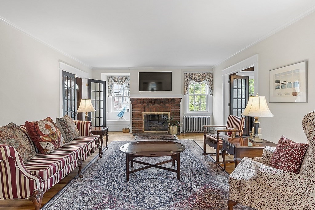 65 Commodore Road Worcester, MA 01602 - Photo 8 of 33 a living room with furniture fireplace and window