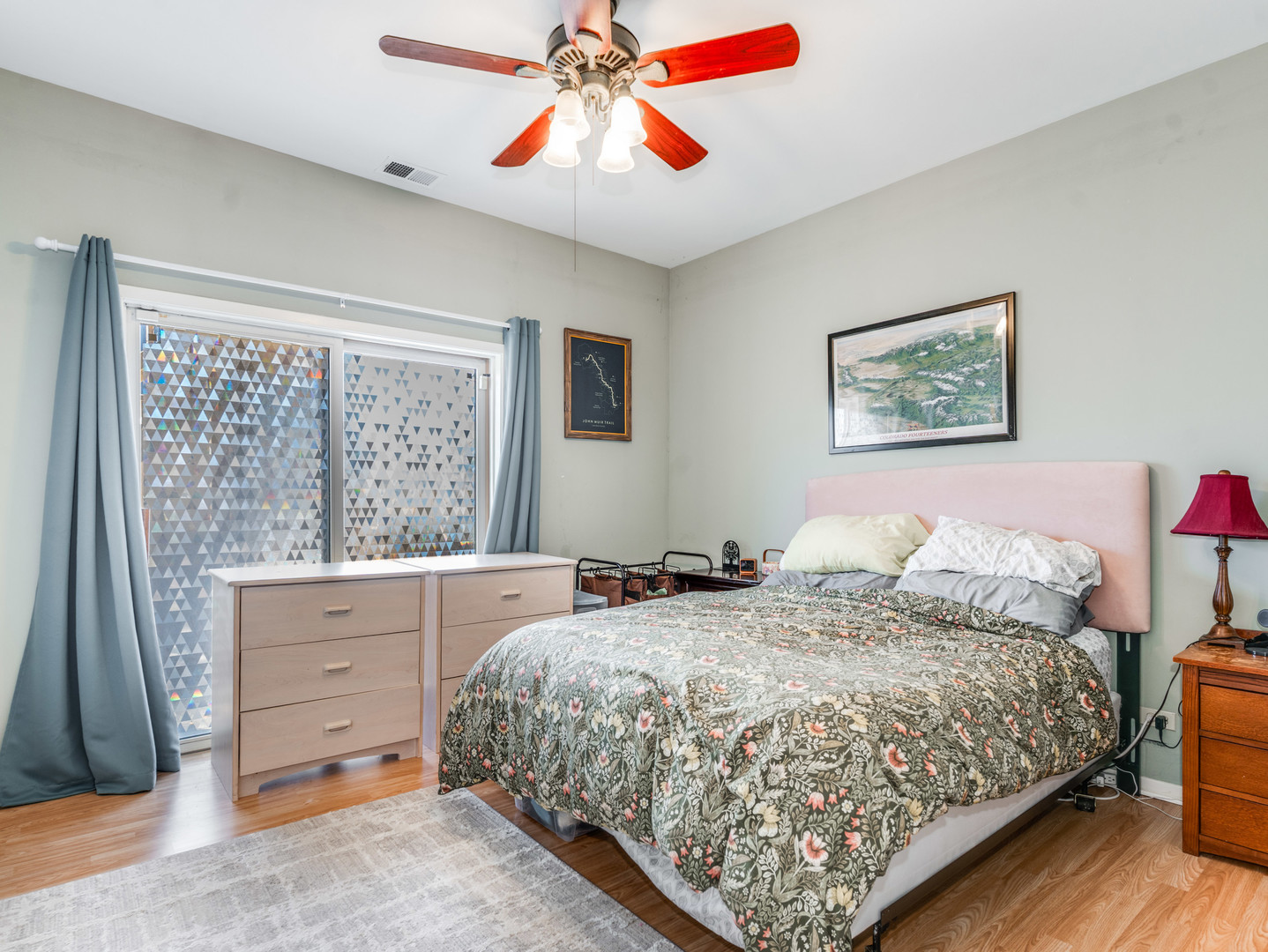 1335 West Fillmore Street, Unit B Chicago, IL 60607 - Photo 11 of 19 a bedroom with a bed and a window