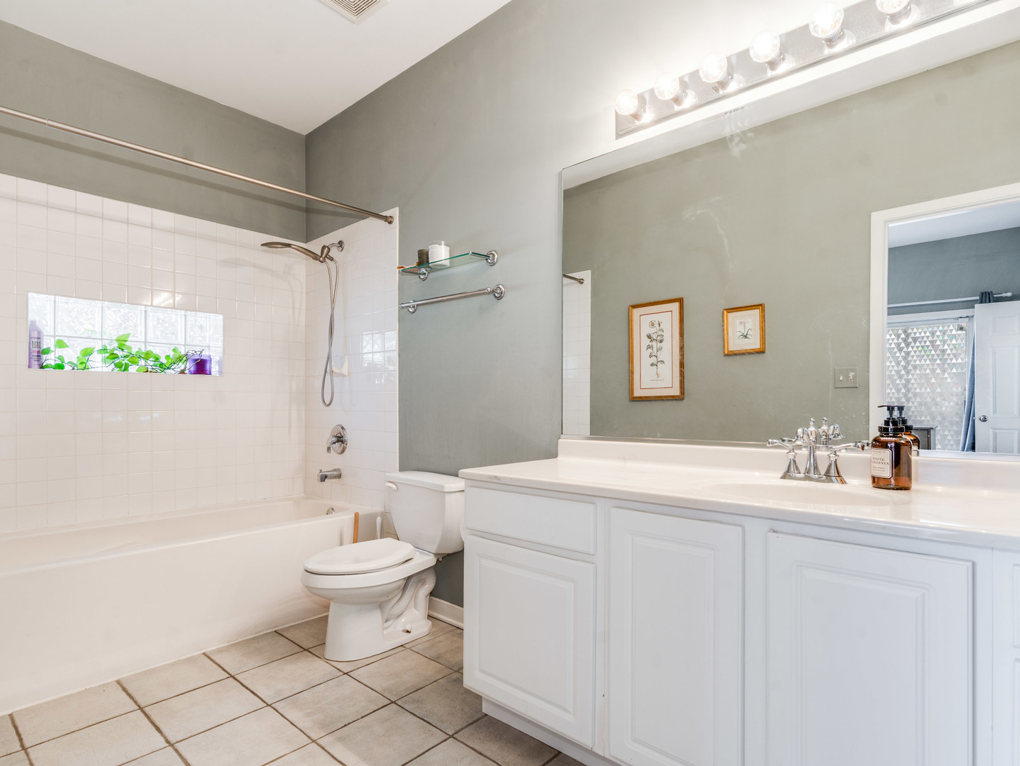 1335 West Fillmore Street, Unit B Chicago, IL 60607 - Photo 13 of 19 a bathroom with a sink toilet and shower