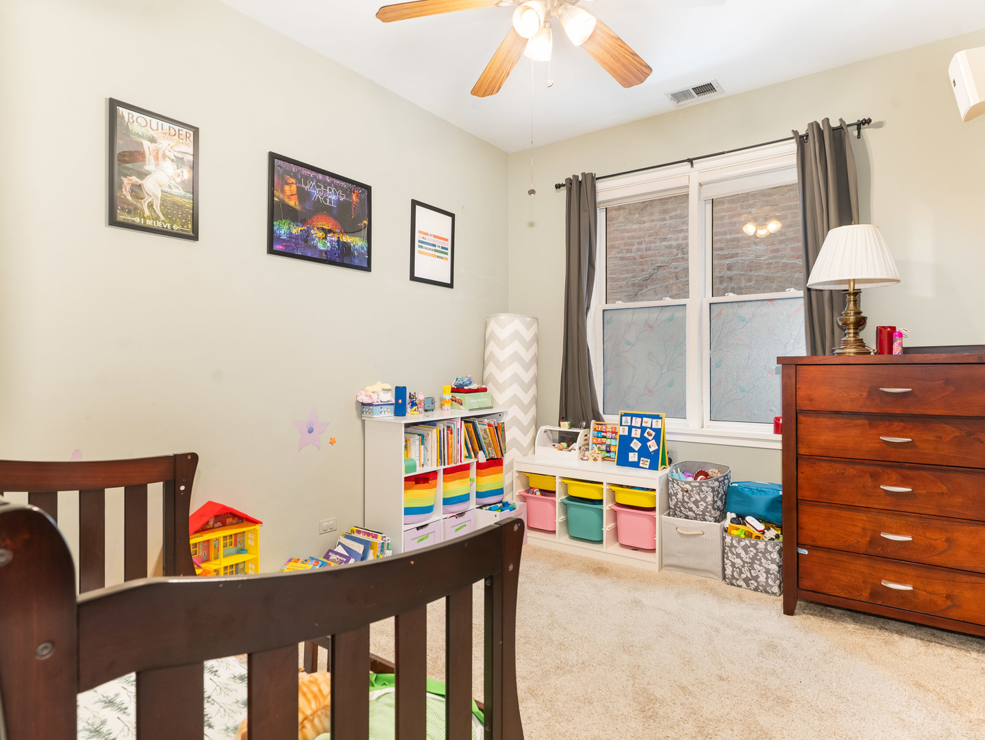 1335 West Fillmore Street, Unit B Chicago, IL 60607 - Photo 14 of 19 a play room with furniture and a window