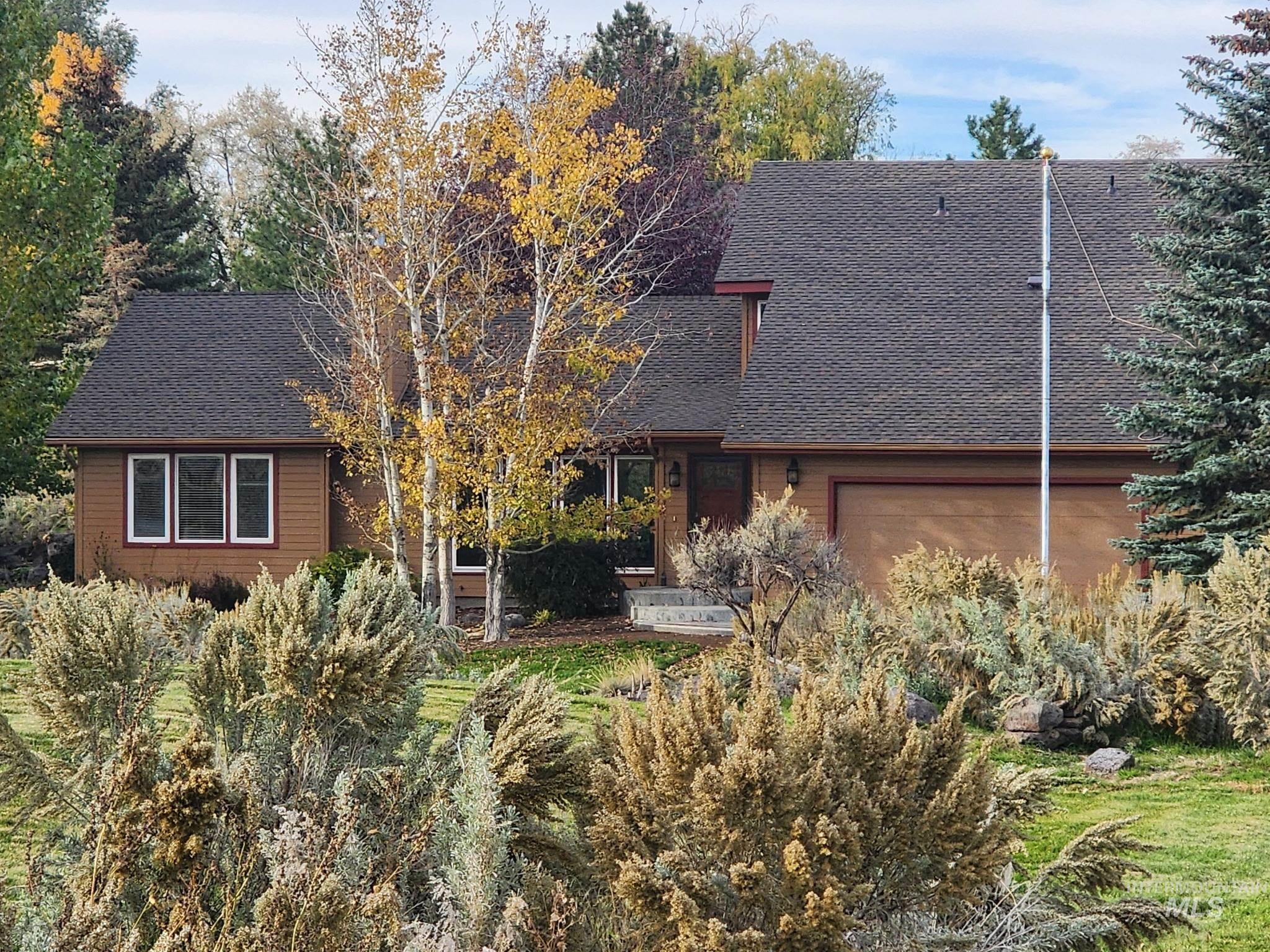 4124 North Meadow Ridge Circle Twin Falls, ID 83301 - Photo 23 of 31 View of front facade with roof with shingles