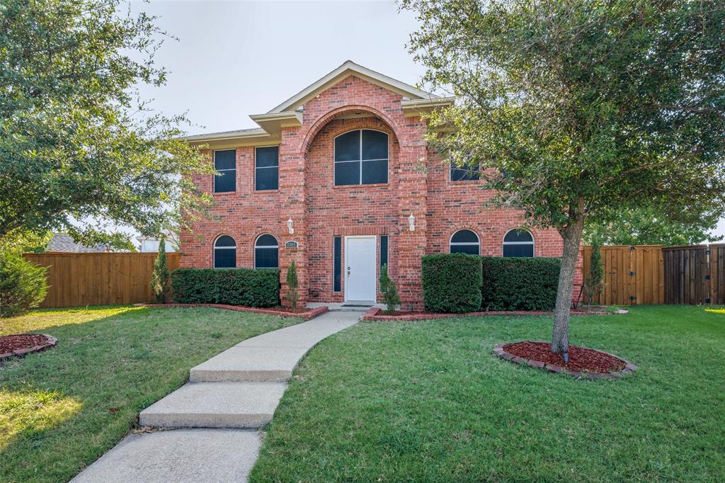 8305 Camden Court Rowlett, TX 75089 - Photo 1 of 18 Traditional-style home featuring brick siding