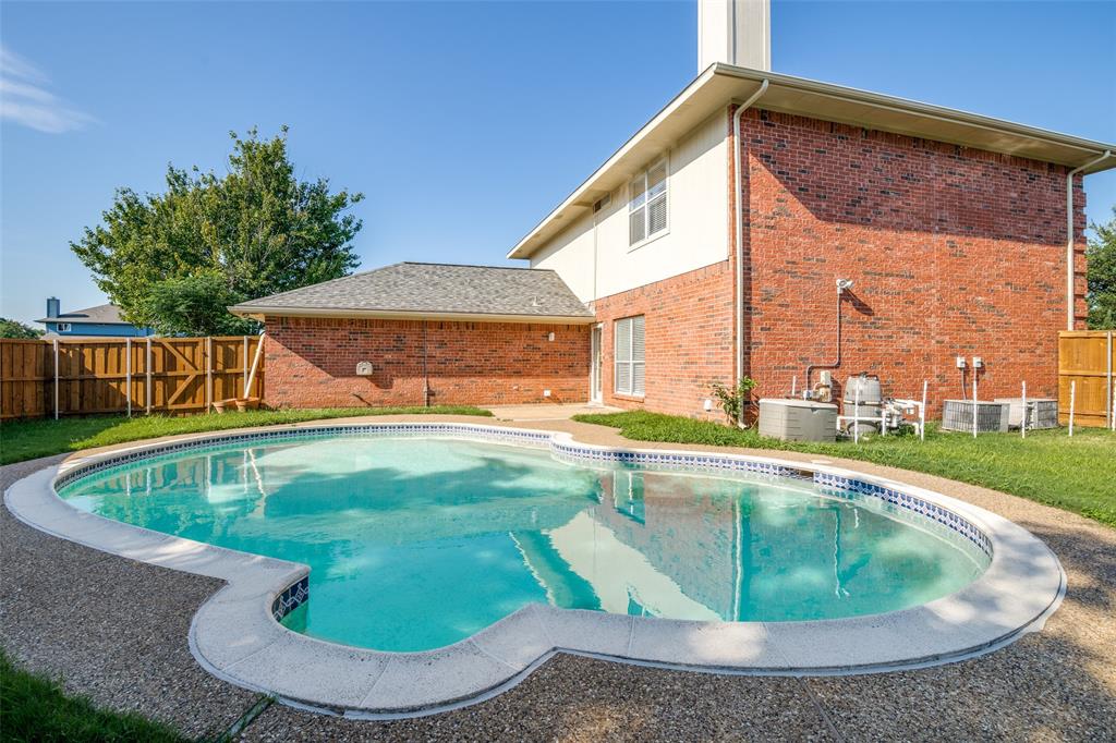 8305 Camden Court Rowlett, TX 75089 - Photo 17 of 18 View of pool with a fenced backyard and a patio