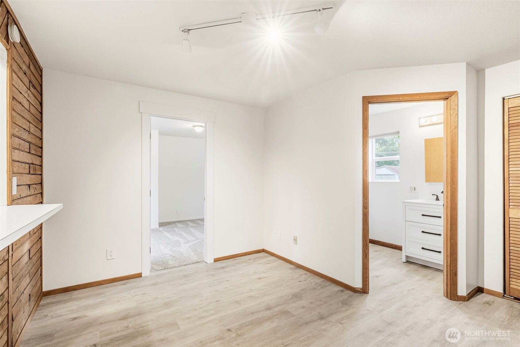 175 Jacobson Road Cathlamet, WA 98612 - Photo 25 of 32 an empty room with wooden floor and closet