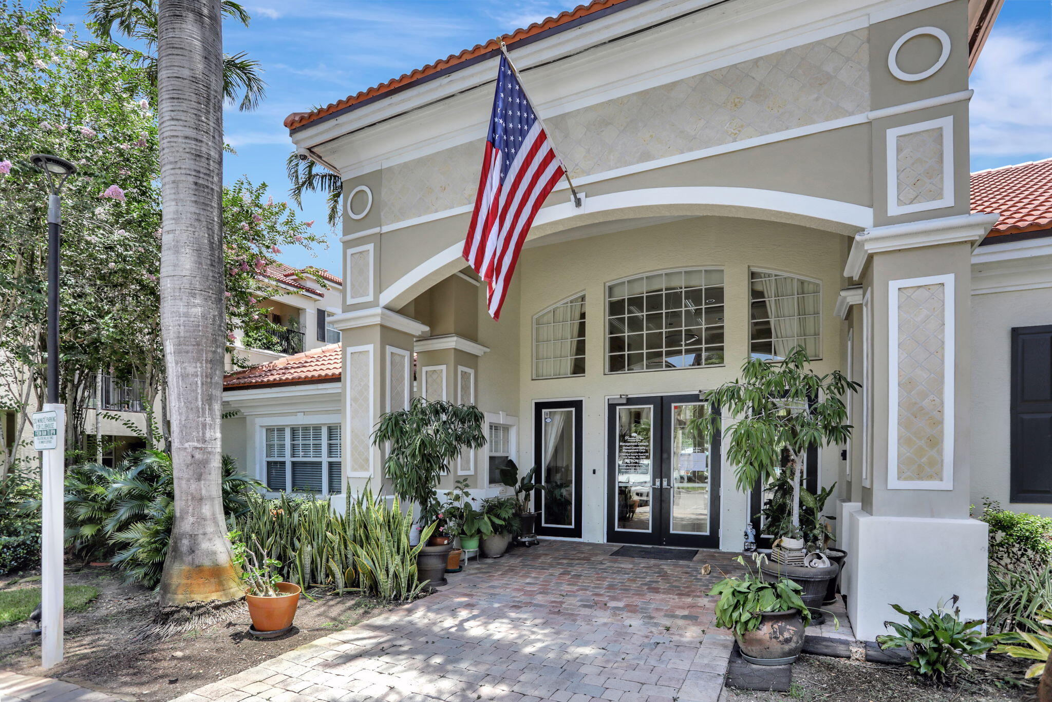 5880 West Sample Road, Unit 206 Coral Springs, FL 33067 - Photo 36 of 37 a front view of a house