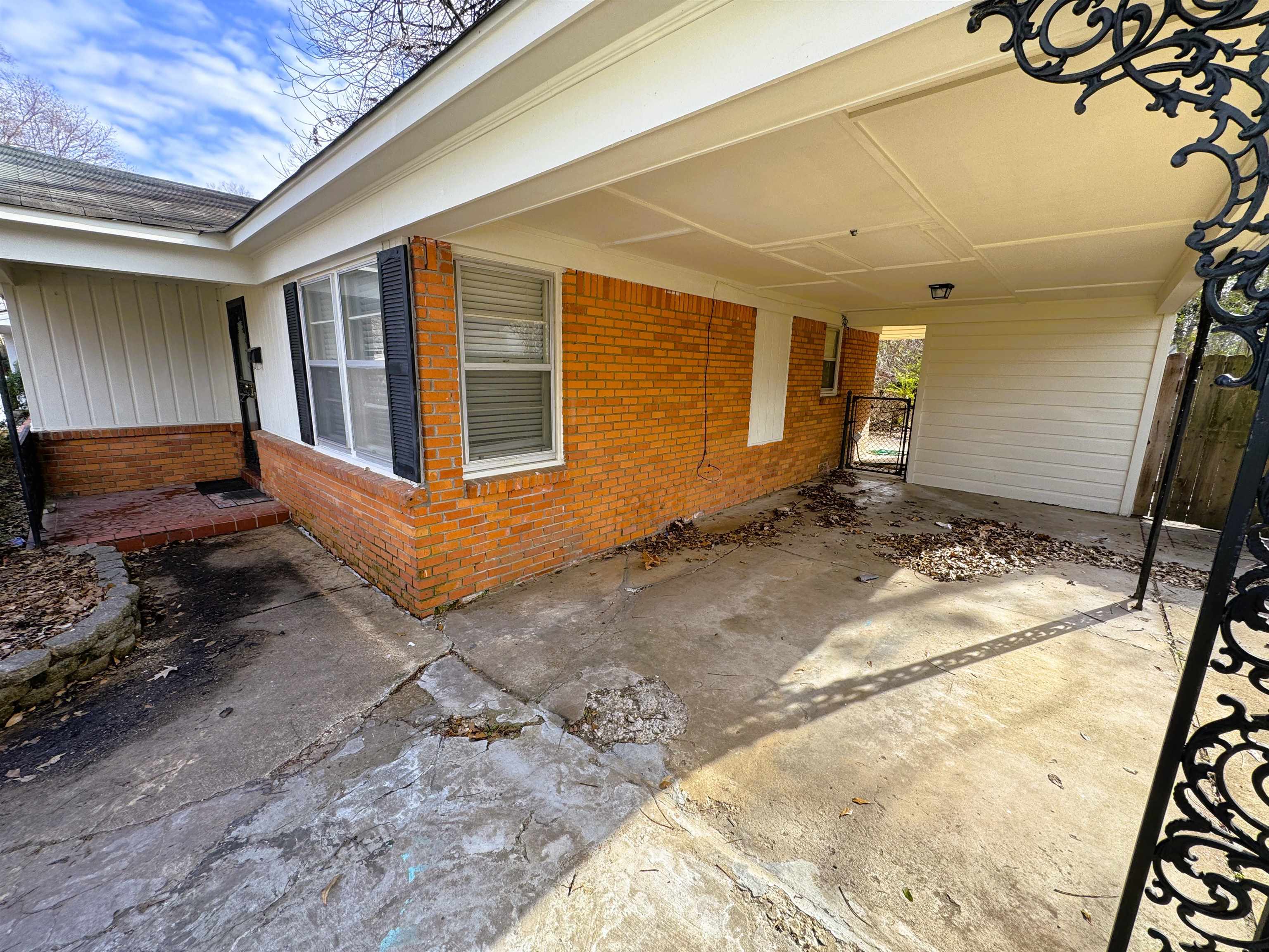 4781 Given Avenue Memphis, TN 38122 - Photo 2 of 15 View of patio featuring a carport