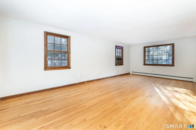 an empty room with windows