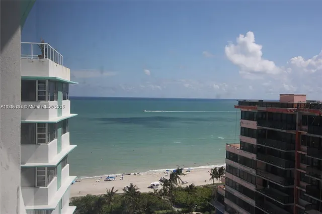 a view of a lake with a building in the background