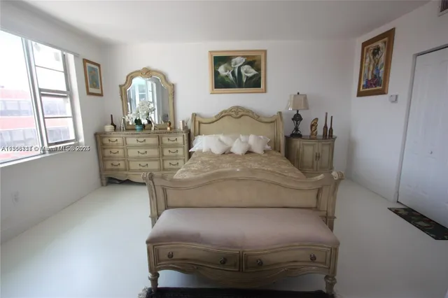 a living room with furniture and windows