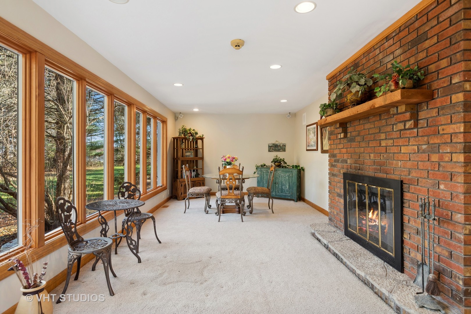 1907 Cherry Valley Road Woodstock, IL 60098 - Photo 11 of 56 a living room with furniture and a fireplace