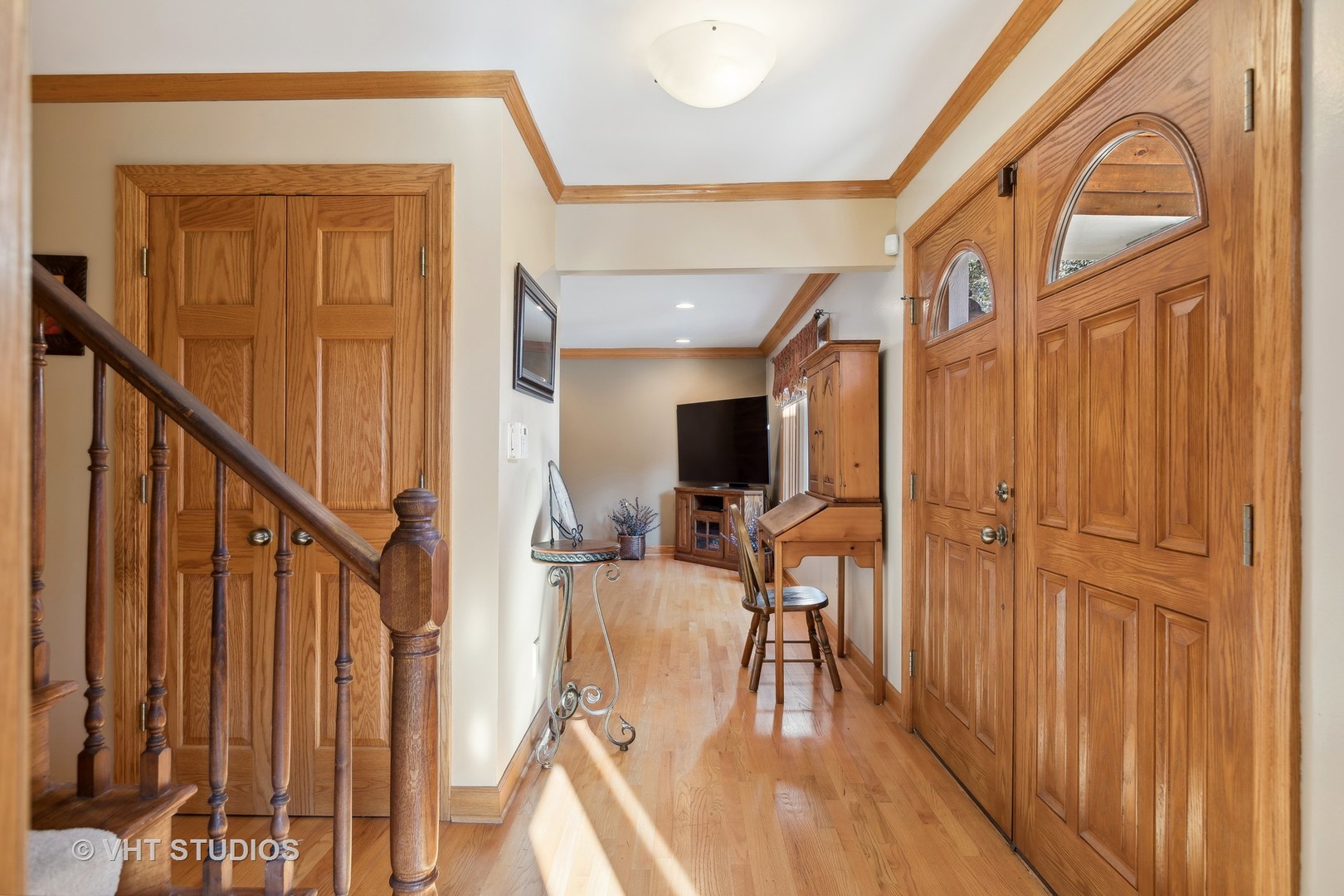 1907 Cherry Valley Road Woodstock, IL 60098 - Photo 14 of 56 a view of a hallway with wooden floor and staircase