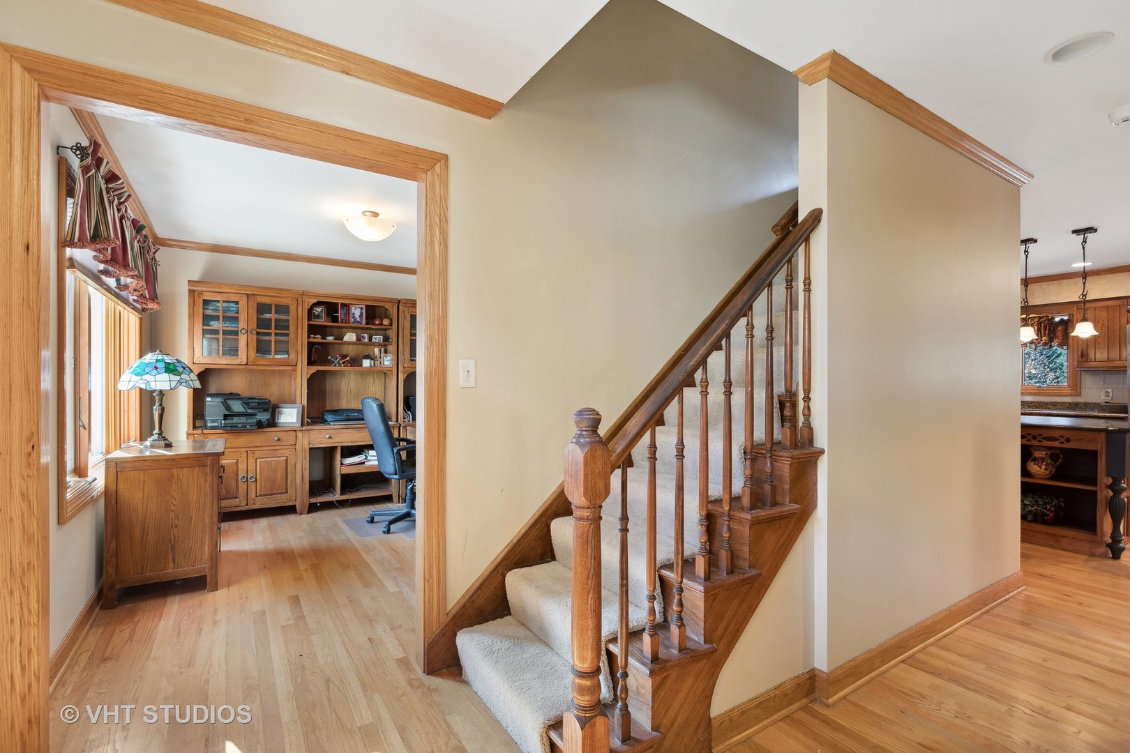1907 Cherry Valley Road Woodstock, IL 60098 - Photo 15 of 56 a view of a hallway with wooden floor and staircase