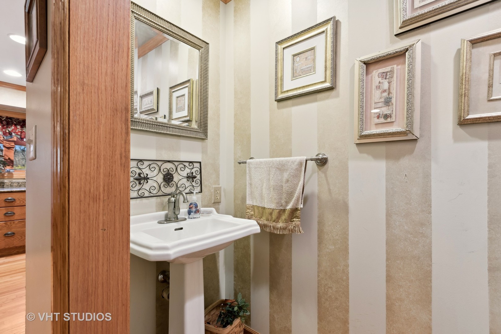 1907 Cherry Valley Road Woodstock, IL 60098 - Photo 16 of 56 a bathroom with a sink and a mirror