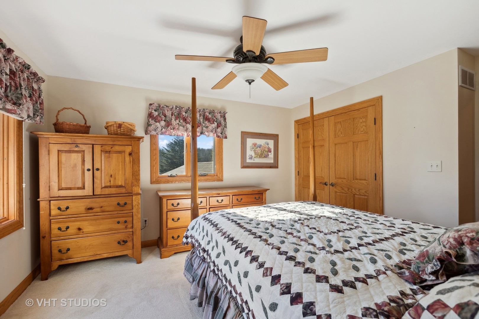 1907 Cherry Valley Road Woodstock, IL 60098 - Photo 19 of 56 a bedroom with a bed and a dresser