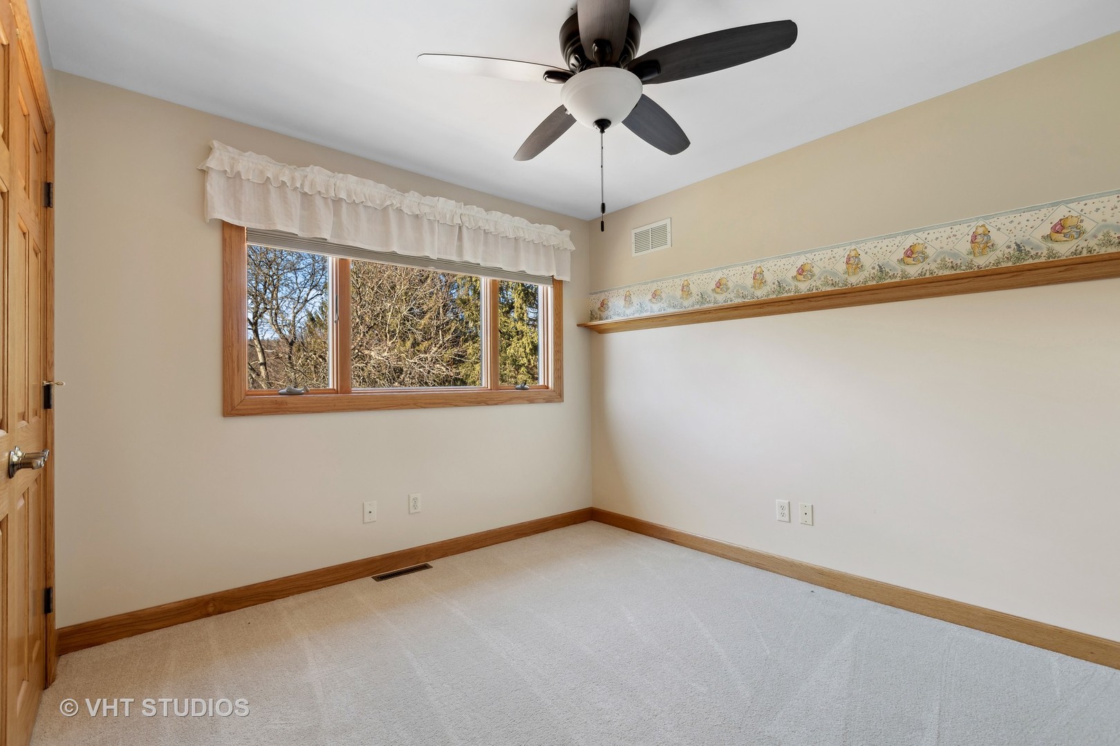 1907 Cherry Valley Road Woodstock, IL 60098 - Photo 21 of 56 a view of an empty room with a window