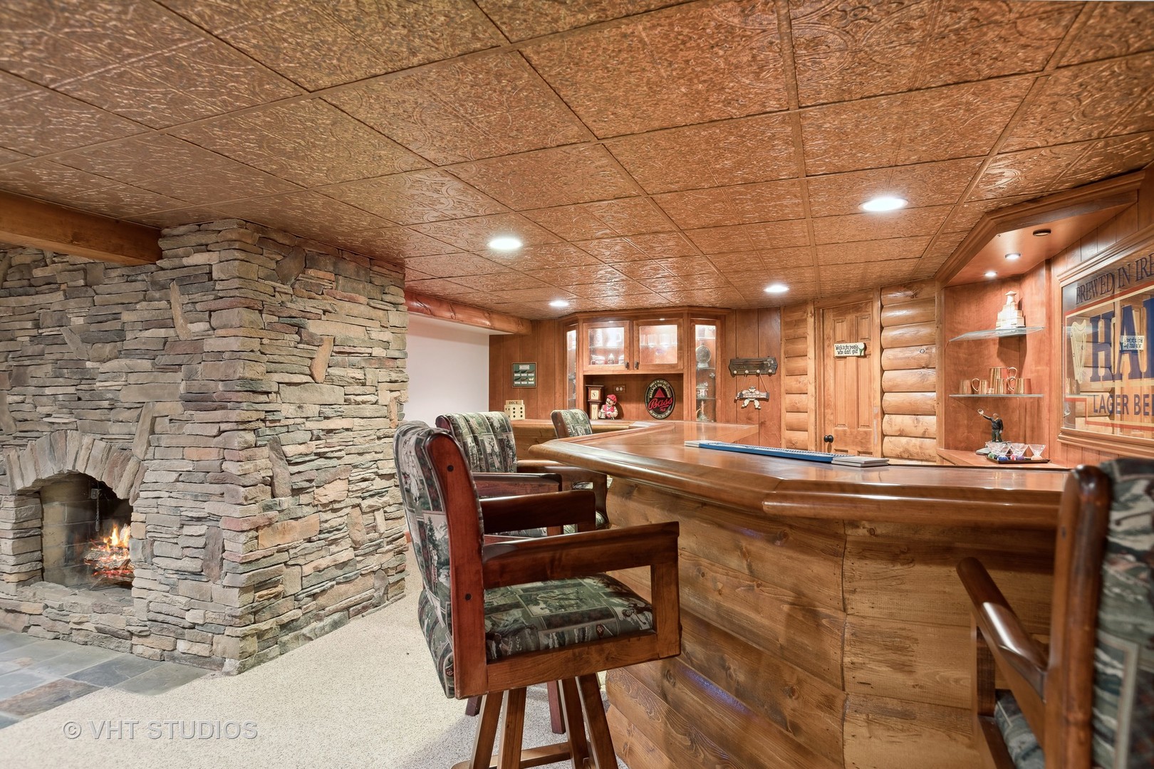 1907 Cherry Valley Road Woodstock, IL 60098 - Photo 23 of 56 a kitchen with stainless steel appliances kitchen island granite countertop a sink and cabinets