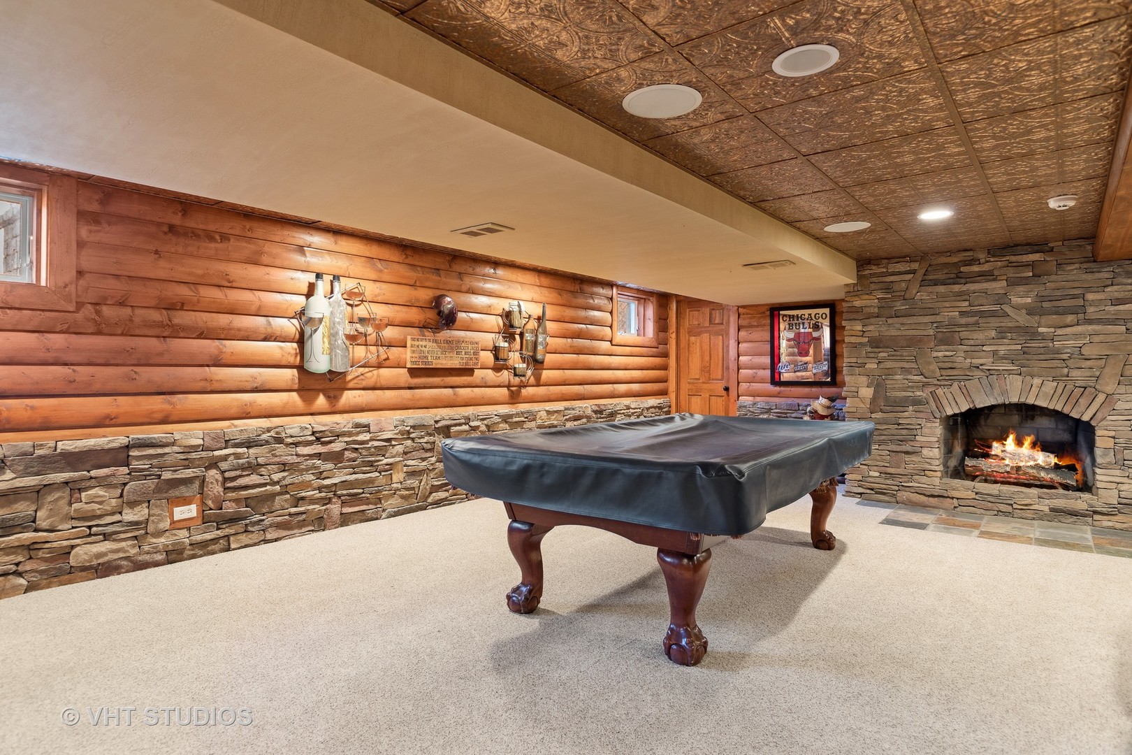 1907 Cherry Valley Road Woodstock, IL 60098 - Photo 26 of 56 a living room with a pool table and a fireplace