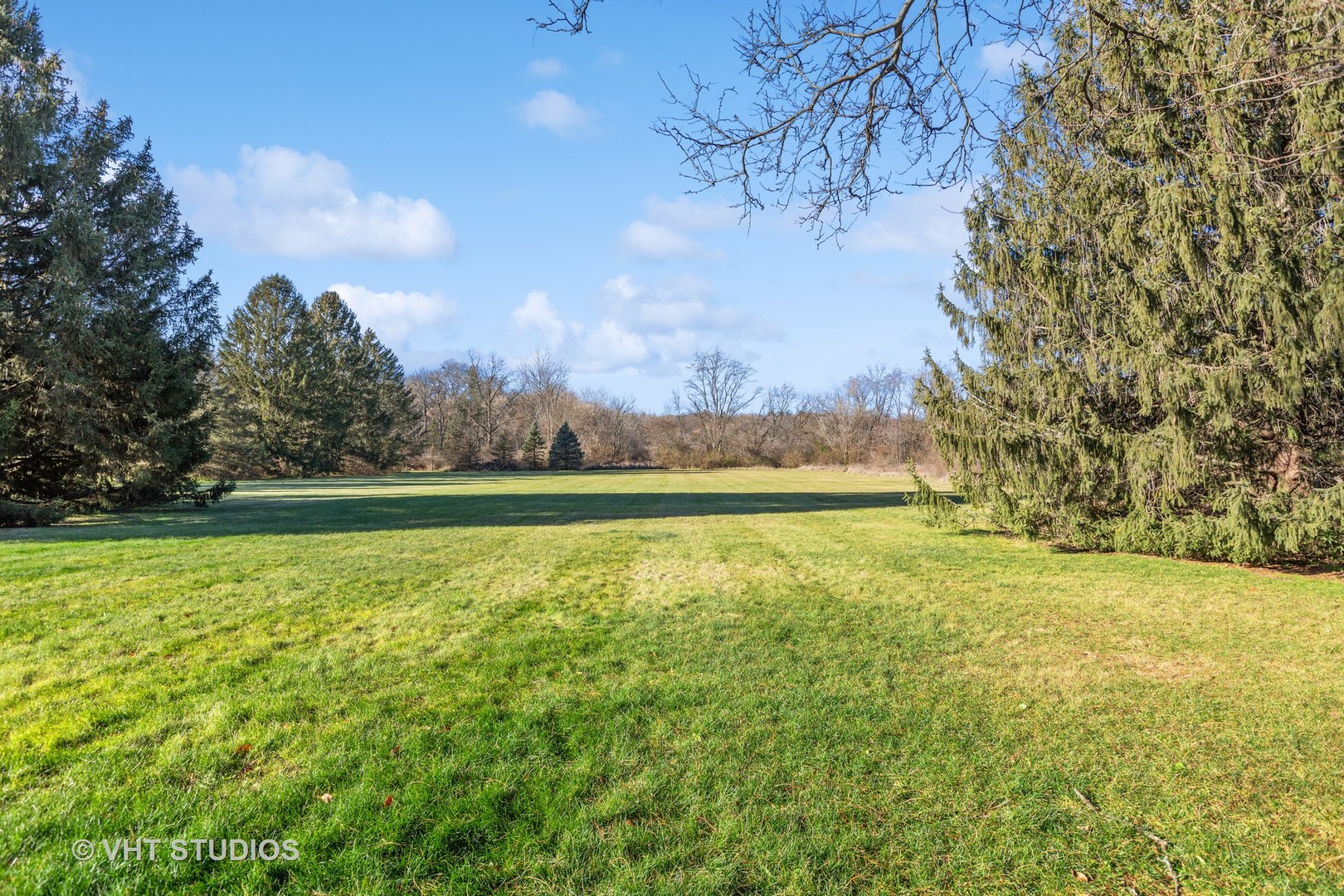 1907 Cherry Valley Road Woodstock, IL 60098 - Photo 33 of 56 a view of a yard with an outdoor space