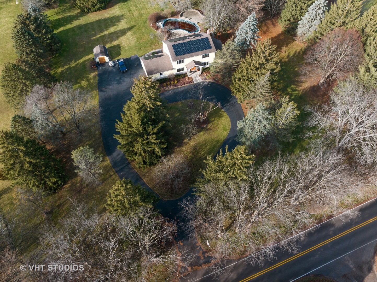 1907 Cherry Valley Road Woodstock, IL 60098 - Photo 43 of 56 a view of a yard with a house