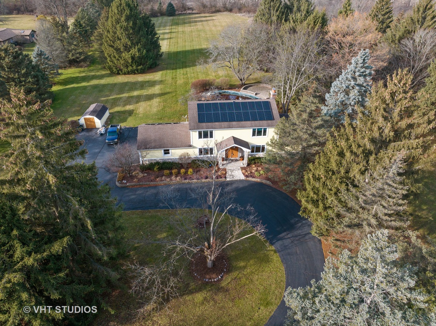 1907 Cherry Valley Road Woodstock, IL 60098 - Photo 51 of 56 a view of a lake with outdoor space